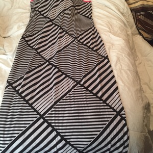 Size large maxi dress black and white with pink trim is being swapped online for free
