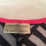 Size large maxi dress black and white with pink trim is being swapped online for free