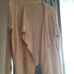 Size extra-large sweater light khaki is being swapped online for free