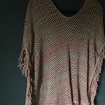 Multi colored poncho is being swapped online for free