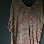 Multi colored poncho is being swapped online for free