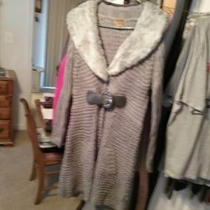 Warm sweater coat is being swapped online for free