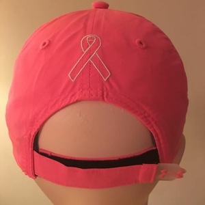Under ARMOUR pink breast cancer hat-adjustable sizing is being swapped online for free