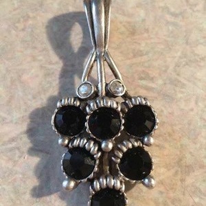 Boho feather jewelry!!One Pair Is Sterling!!! is being swapped online for free