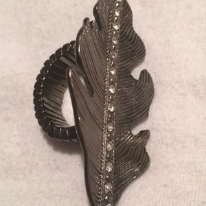 Boho feather jewelry!!One Pair Is Sterling!!! is being swapped online for free