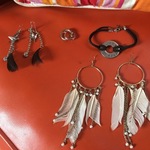 Boho feather jewelry!!One Pair Is Sterling!!! is being swapped online for free
