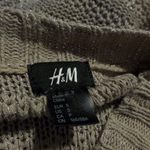 H&M sweater is being swapped online for free