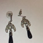 SILVER AND BLACK COLORED EARRINGS is being swapped online for free