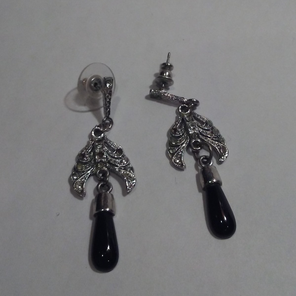 SILVER AND BLACK COLORED EARRINGS is being swapped online for free