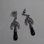 SILVER AND BLACK COLORED EARRINGS is being swapped online for free