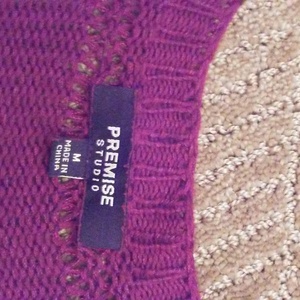 burgundy knit long sweater is being swapped online for free