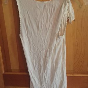 Juicy Couture White Tank Size Medium is being swapped online for free