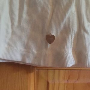 Juicy Couture White Tank Size Medium is being swapped online for free