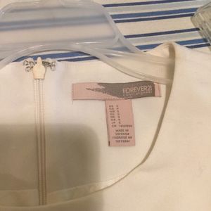 Forever 21 White Dress Small is being swapped online for free