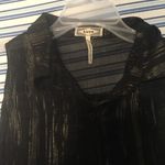 Kirra Black And Gold Button Up Top Small is being swapped online for free
