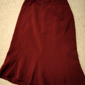 Maroon knee length skirt is being swapped online for free