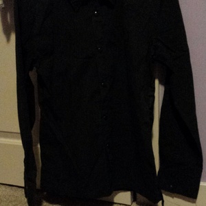 ZOOM Black dress shirt with snap buttons is being swapped online for free