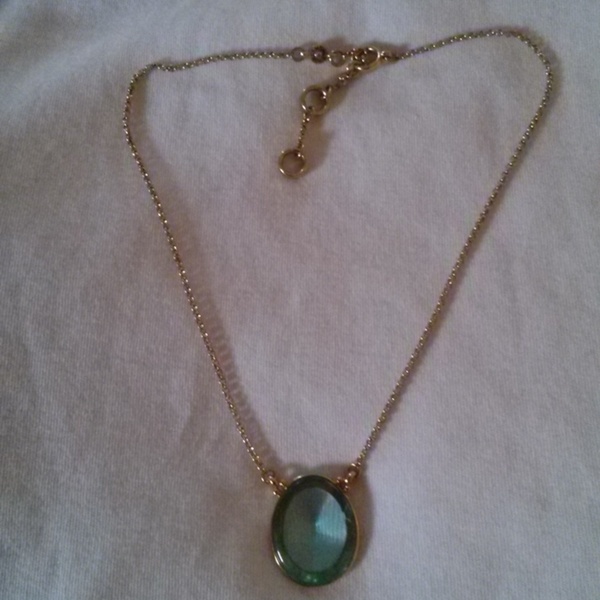 Green glass and gold necklace is being swapped online for free