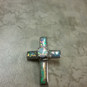 Sterling Opal cross pendant is being swapped online for free