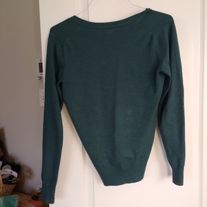 Plain teal cardigan is being swapped online for free
