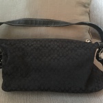 Coach Black small Purse is being swapped online for free