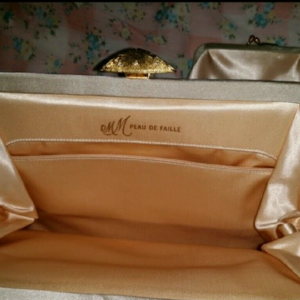 Vintage MM Peau De  Faille Satin Clutch  is being swapped online for free