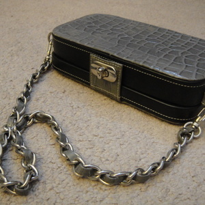 Dark Grey, Black, and  Metal  Chain purse is being swapped online for free