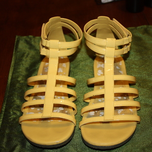 Yellow Flat Shoes, size 7.5, great condition. Velcro straps, easy to adjust. Hardly worn. Cute for summer!! is being swapped online for free