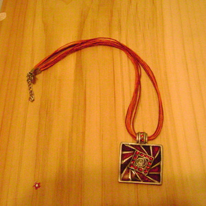 Red Square Pendant on multiple string necklace is being swapped online for free