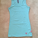 Baby Blue Tank Top with Pink Dog is being swapped online for free