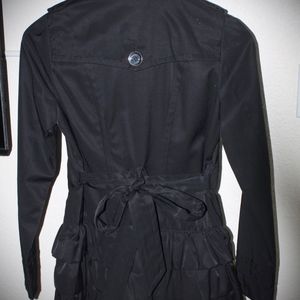 EXPRESS Black Button-Down Ruffle Hem Jacket (sz. extra small) is being swapped online for free