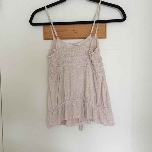 Vero Moda Soft Pink Ruffled Tank Top with Bottom Tie  is being swapped online for free