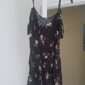 Adorable black romper with flowers  is being swapped online for free