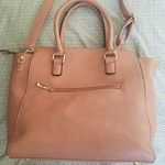 Blush pink purse with bow  is being swapped online for free