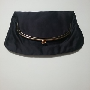 Vintage Satin Blue clutch is being swapped online for free
