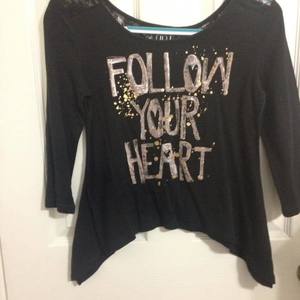 Juniors Small. Follow your heart shark bite style tee with lace embellishment.  is being swapped online for free