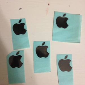 5 Black Apple Iphone stickers.  is being swapped online for free
