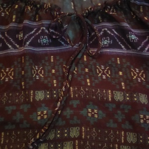 Casual sheer top in maroon & purple is being swapped online for free