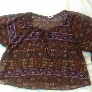 Casual sheer top in maroon & purple is being swapped online for free