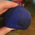 Danier genuine leather blue change purse is being swapped online for free