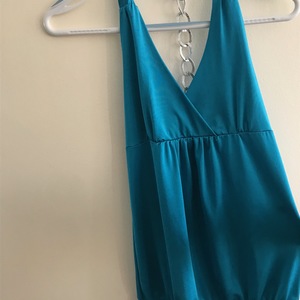 small turquoise halter top with silver chain  is being swapped online for free
