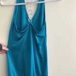 small turquoise halter top with silver chain  is being swapped online for free