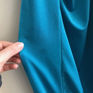 small turquoise halter top with silver chain  is being swapped online for free