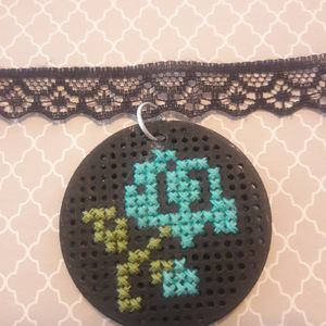 Handmade cross stitched wooden rose choker is being swapped online for free