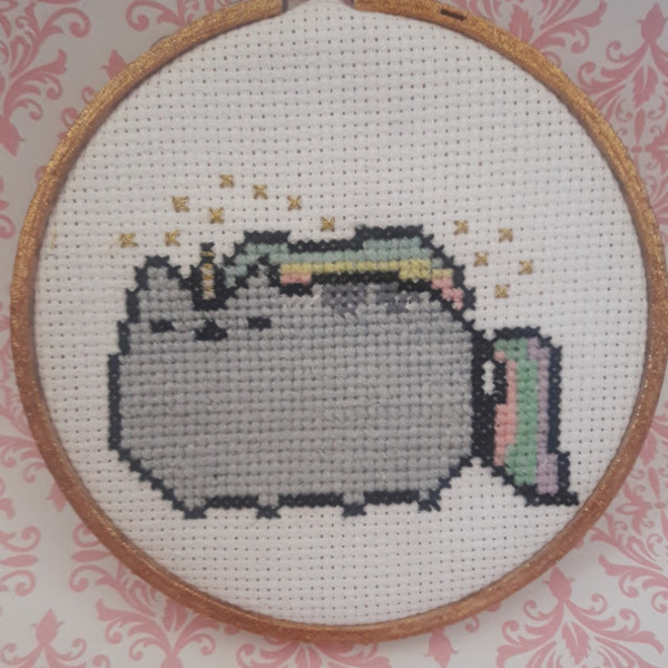 Pusheen Unicorn Cross stitch in gold glitter hoop is being swapped online for free