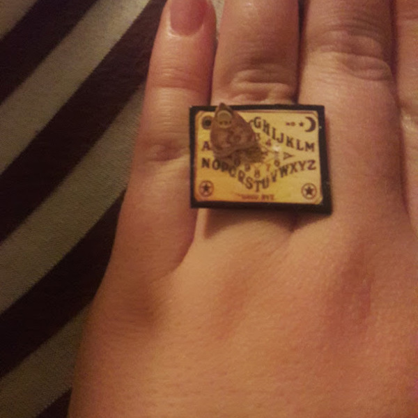 Mini Ouija board ring with planchette is being swapped online for free