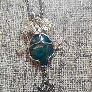 Beautiful wire wrapped blue stone necklace with chain is being swapped online for free