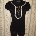 Bebe tuxedo chain blouse Size L is being swapped online for free