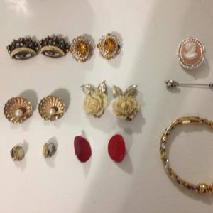 Vintage clip on earrings//bracelet//pins (top two earrings missing stones) is being swapped online for free