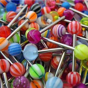 Brand New !! Lot of 11 tongue ring piercing  is being swapped online for free